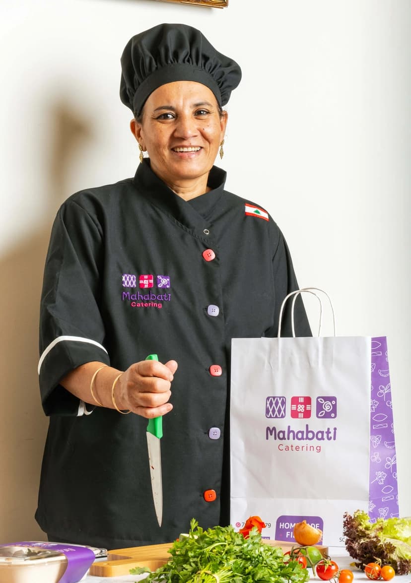 Chef Mahaba preparing homemade meals for Mahabati Catering